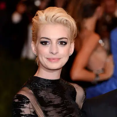 Anne Hathaway with short bleached blonde hair at the 2013 Met Gala.