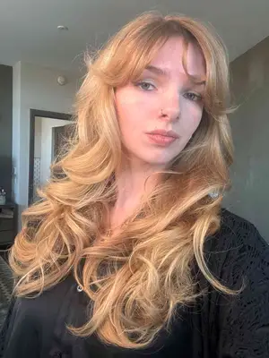 MYM Beauty editor Ali Webb with voluminous glam hairstyle