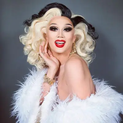 Drag queen Manila Luzon wears a platinum blonde wig with black streaks