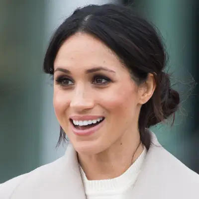Chignon Center Part Meghan Markle