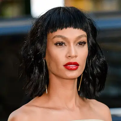 Joan Smalls wears a long bob with bangs