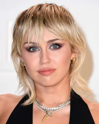 Miley Cyrus with a shaggy mullet hairstyle
