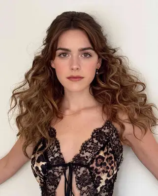 Actor Kiernan Shipka with fluffy, brushed out curls