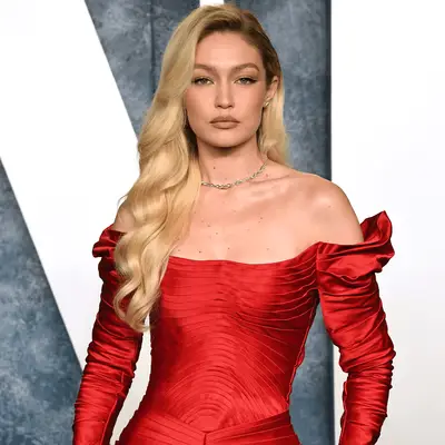 Gigi Hadid wearing a red gown
