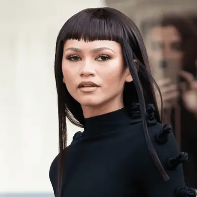 Zendaya wearing long hair with v-shaped bangs