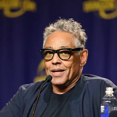 Giancarlo Esposito with a messy top quiff