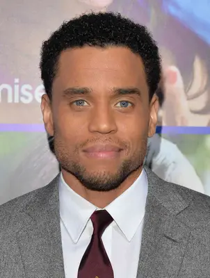 Michael Ealy with close cropped curly hair
