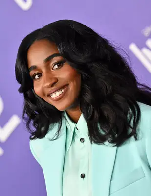 Ayo Edebiri with a voluminous blow out