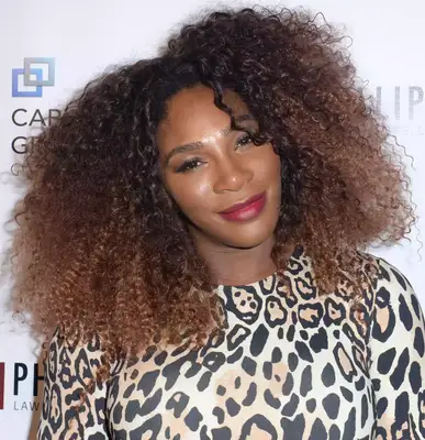 Serena Williams wearing voluminous curly hair