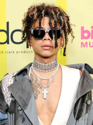 Iann Dior with loc bangs 