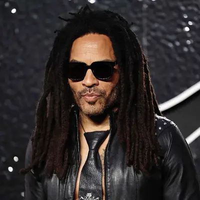 Lenny Kravitz with long locs 