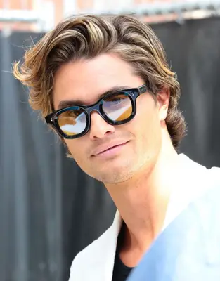 Chase Stokes flow haircut with glasses