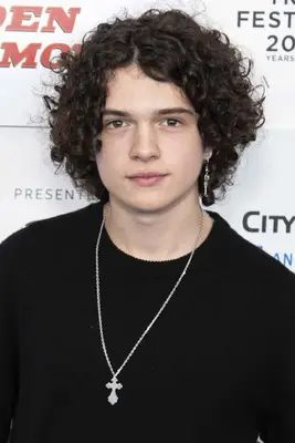 Noah Jupe with curly curtain style