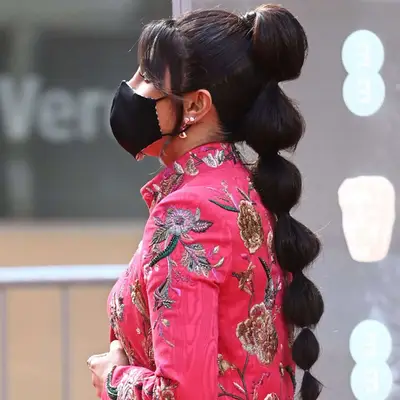 Rear view of a blonde bubble ponytail