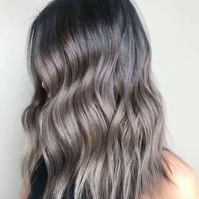Side view of brunette hair with silver-toned balayage