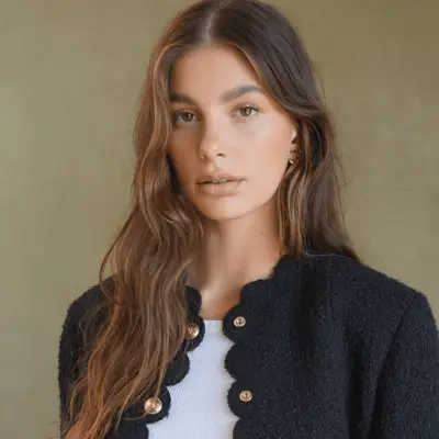 Side view of smoky silver balayage hair with brunette roots