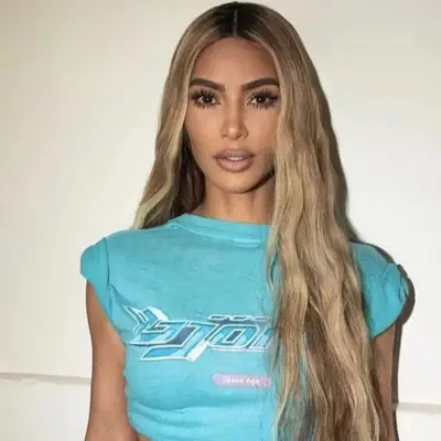 Kim Kardashian with honey blonde hair extensions