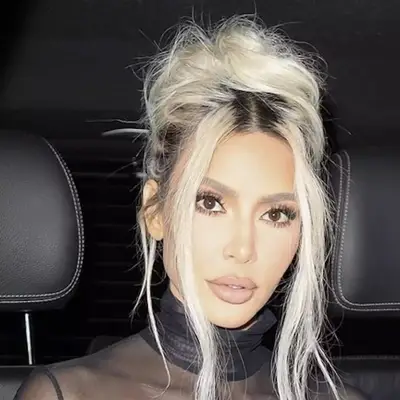 Kim Kardashian with textured blonde updo