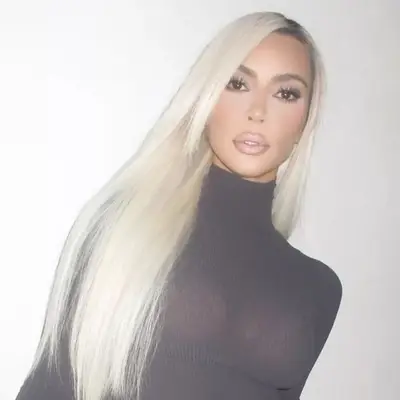 Kim Kardashian with long, straight blonde hair