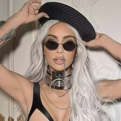 Kim Kardashian with white-blonde wavy hair