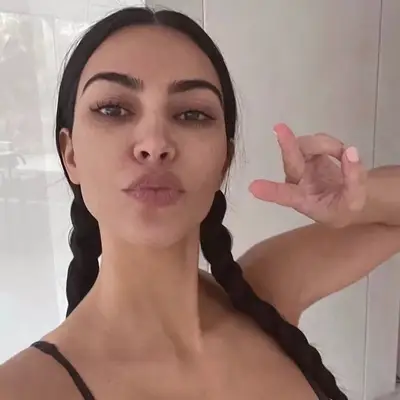 Kim Kardashian with braided pigtails