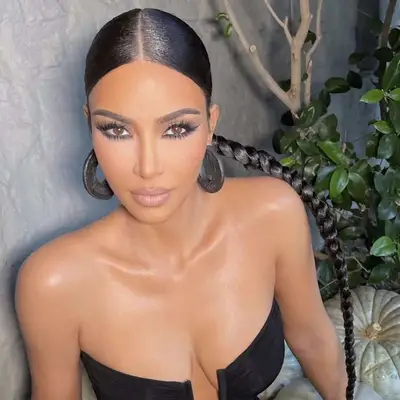 Kim Kardashian with a long maxi braid