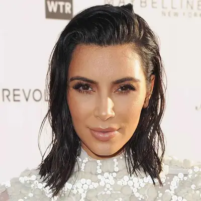 Kim Kardashian side flip, shoulder-length wet hair