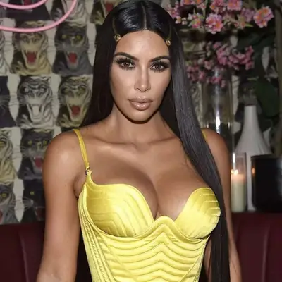 Kim Kardashian with long hair and barrettes