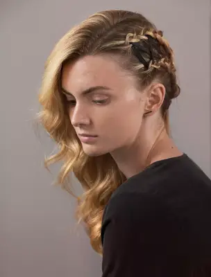 A Black Ribbon woven through a braided hairstyle