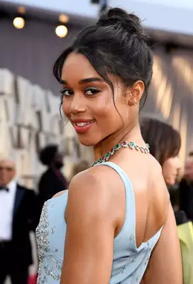 A Messy Bun Hairstyle on Laura Harrier