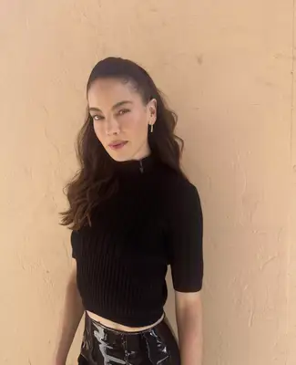 Woman wearing a half-up, half-down hairstyle