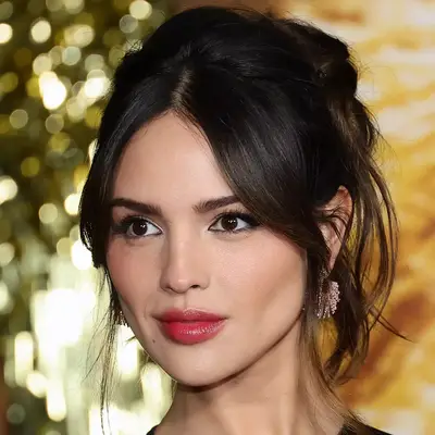 Eiza Gonzalez with messy updo attends the Global Premiere Screening of 