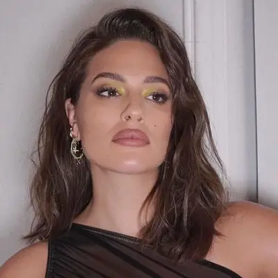 Ashley Graham wears a wavy long bob hairstyle