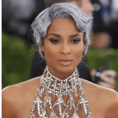 Ciara with short dark gray hair