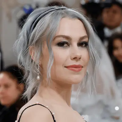 Phoebe Bridgers wearing icy gray updo