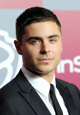 Zac Efron with a pointy crew cut hairstyle at the 2011 InStyle & Warner Brothers Golden Globes Party in Beverly Hills, California