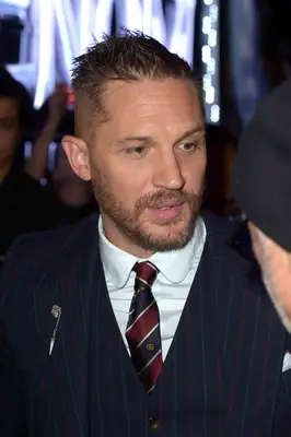 Tom Hardy with a crew cut hairstyle at the 2018 