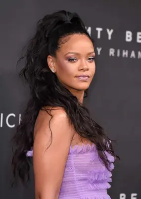 Rihanna wearing a sleek half-up, half-down ponytail