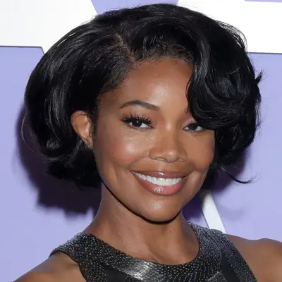 Gabrielle Union with a voluminous wavy bob hairstyle on the red carpet