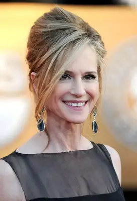 Holly Hunter with a side-swept updo on the red carpet