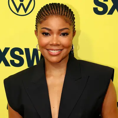 Gabrielle Union with cornrows and long braids on the red carpet