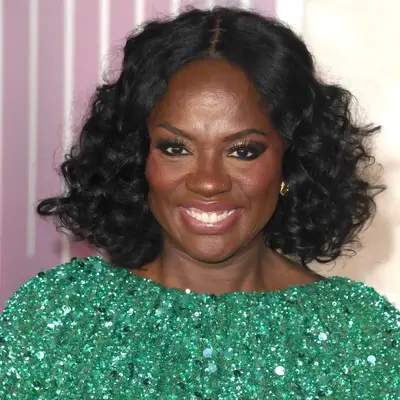 Viola Davis with curly short hair on the red carpet