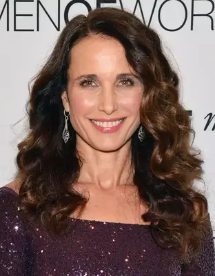 Andie MacDowell with long lush curls on the red carpet