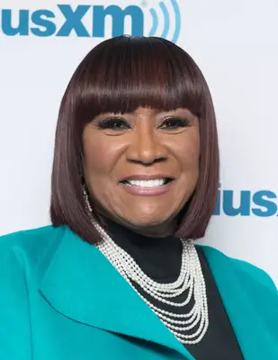 Patti Labelle with a blunt bangs and a bob hairstyle on the red carpet