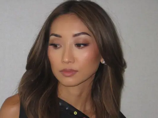 actor brenda song with cool caramel hair and loose waves