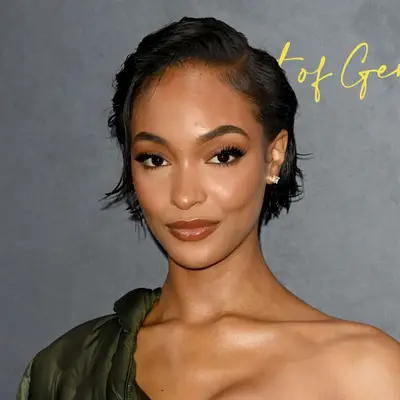 Jourdan Dunn with a wet look, side-parted French bob on the red carpet
