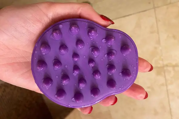 A person using the Comfier Cordless Hair Scalp Massager on their head