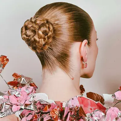 hunter schafer wearing braided bun