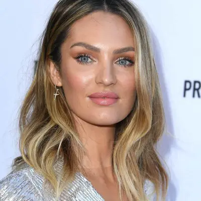 Candice Swanepoel with low-maintenance dark blonde hair at the 2019 Daily Front Row Fashion Los Angeles Awards