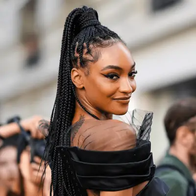 Jordan Dunn wearing her knotless braids in a high ponytail
